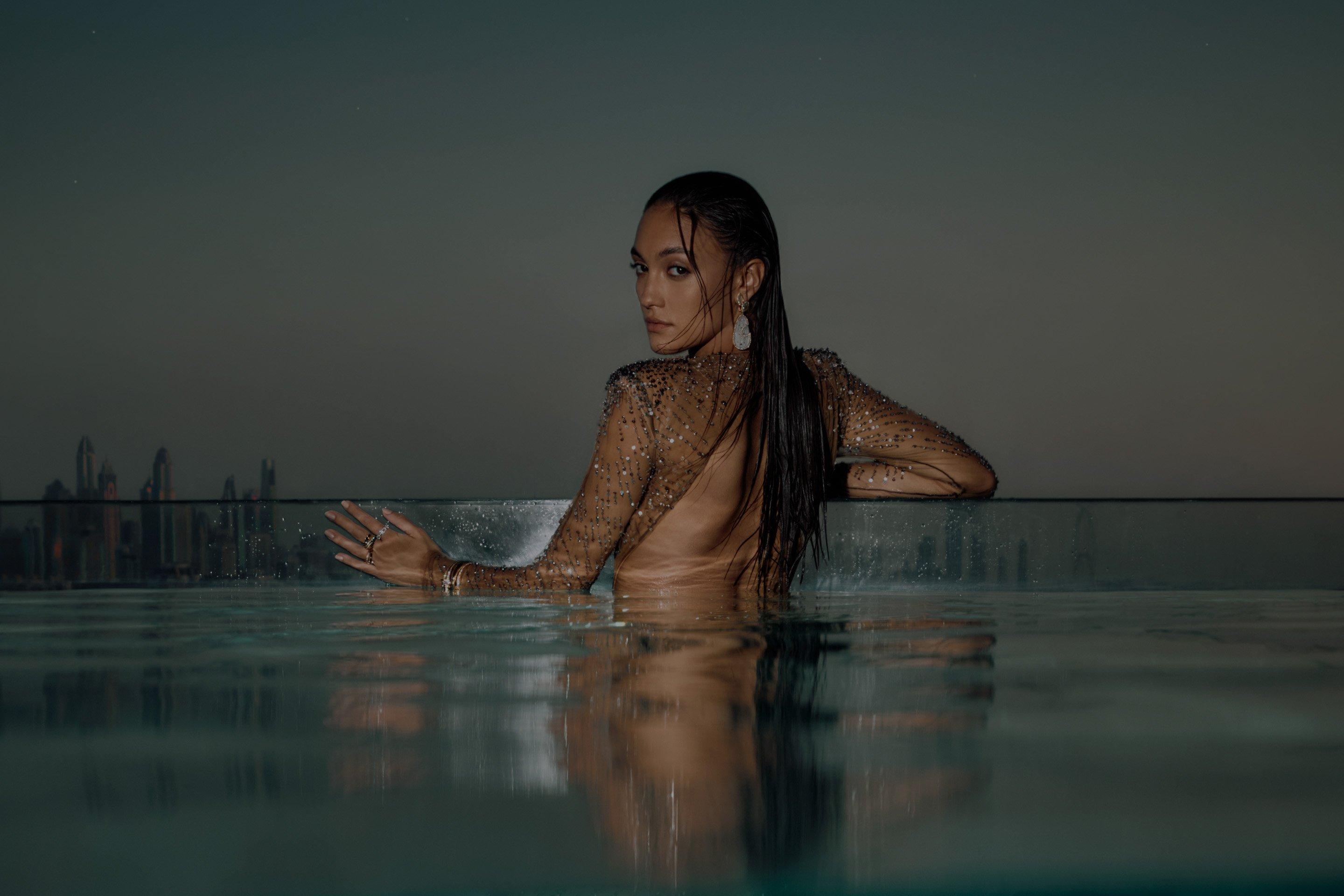 Lady in Pool at Atlantis The Royal