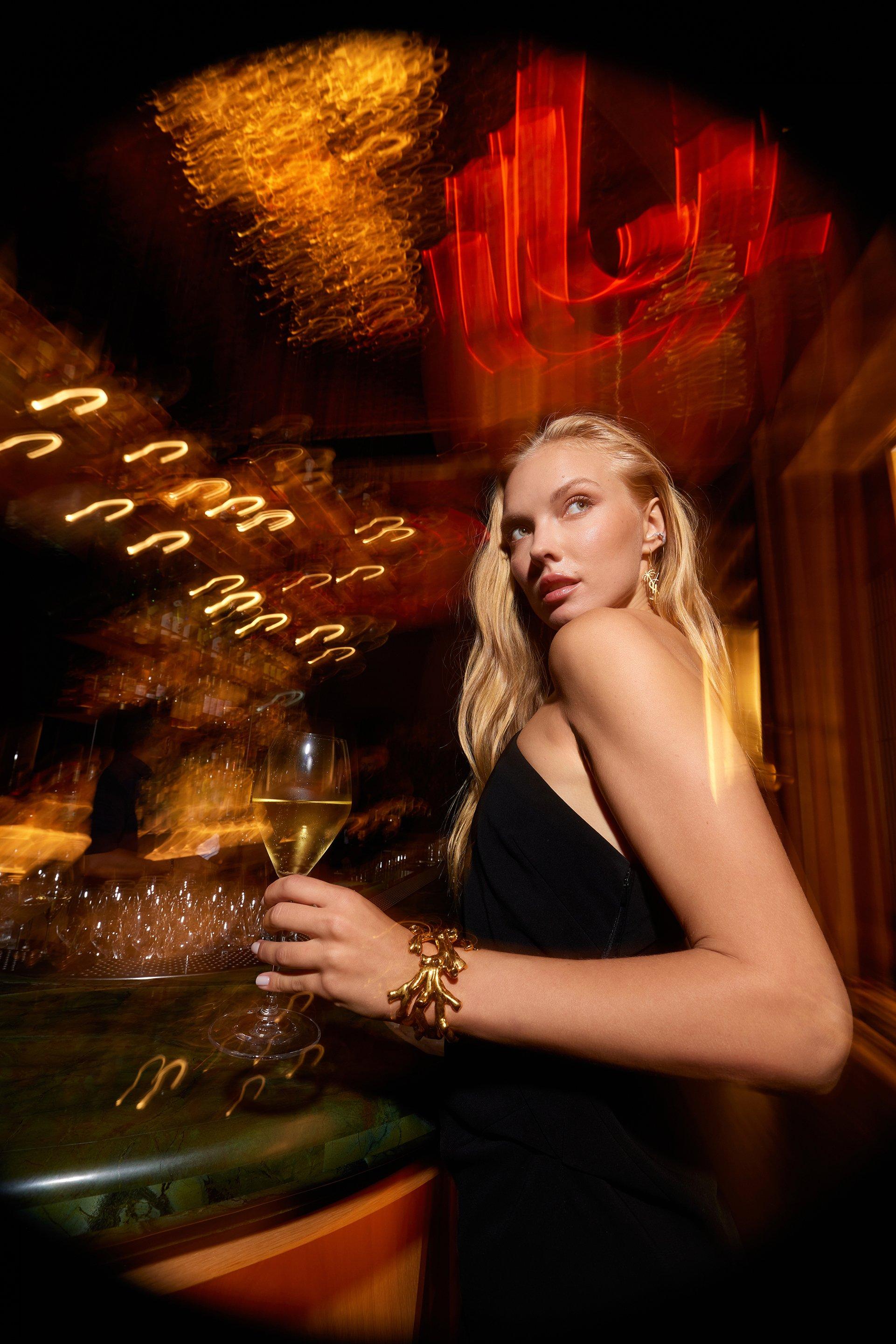 Lady With Drinks at Nobu Dubai