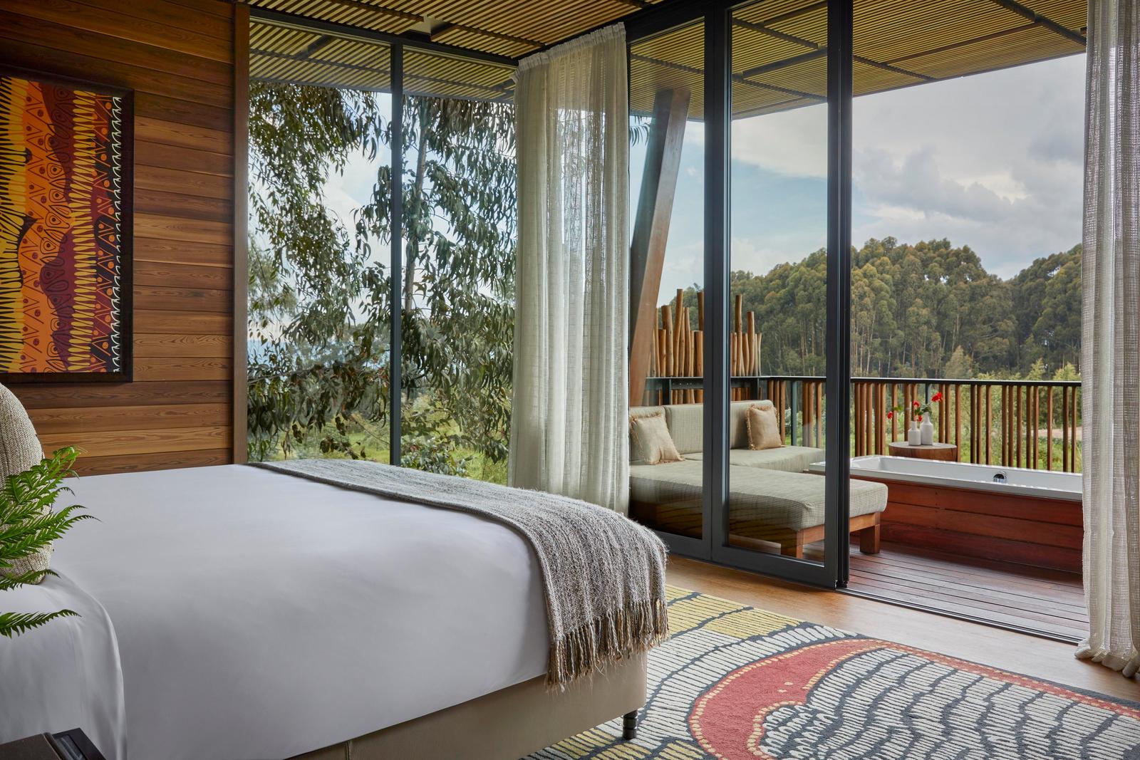 Virunga Suite bedroom and terrace at One&Only Gorilla's Nest