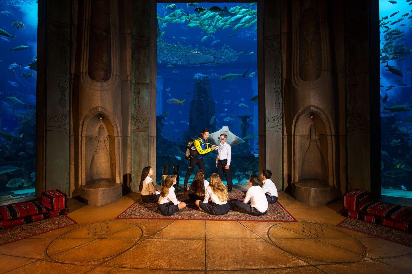 School kids with Marine Educator and Scuba Mask at the Lost World Aquarium