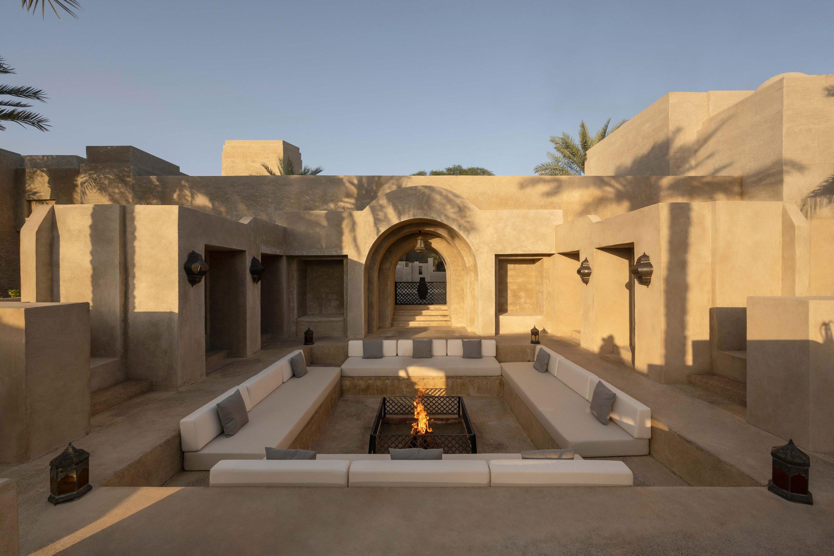 Outdoor sitting with a fire pit at Bab Al Shams