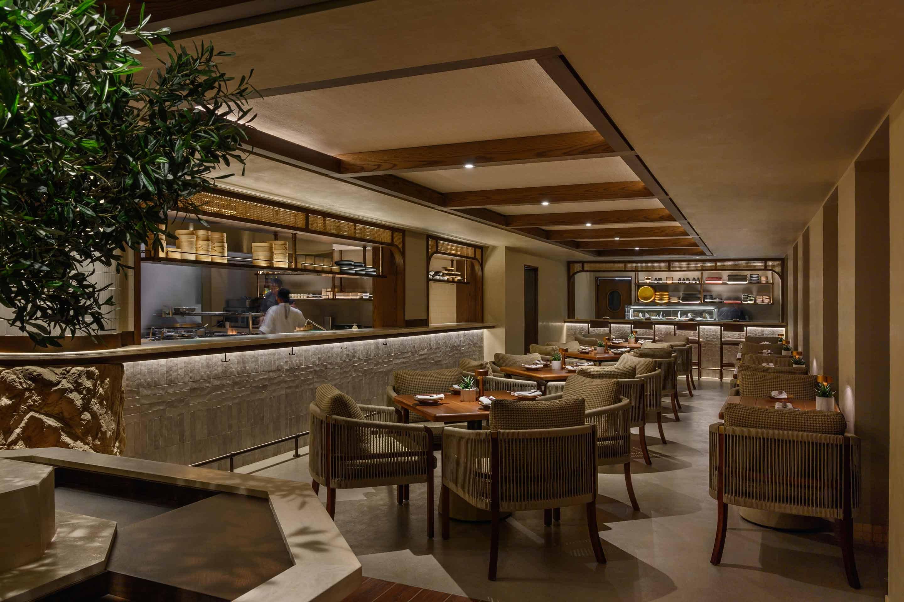 Panoramic view of the spacious dining area at Anwa, Bab Al Shams