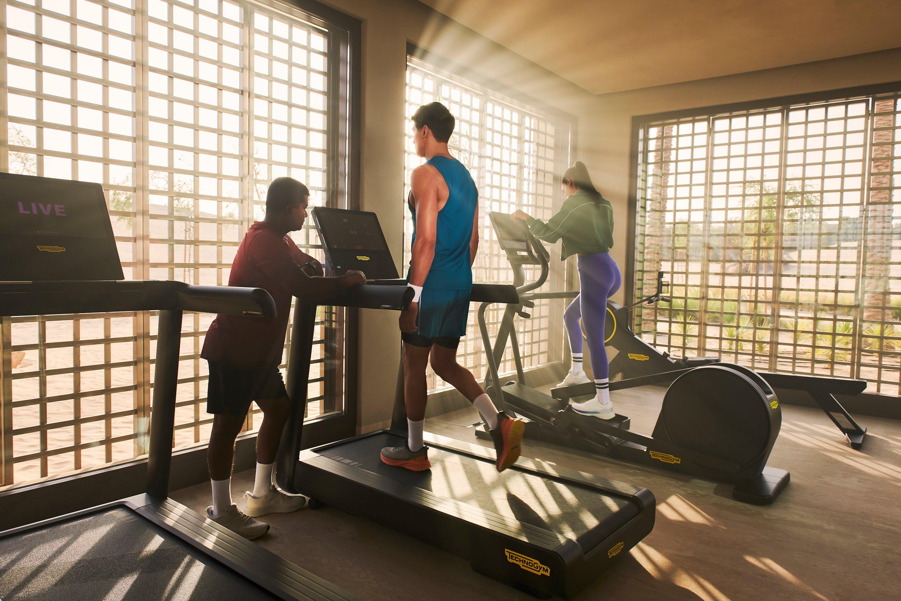 People working out in the gym at Bab Al Shams