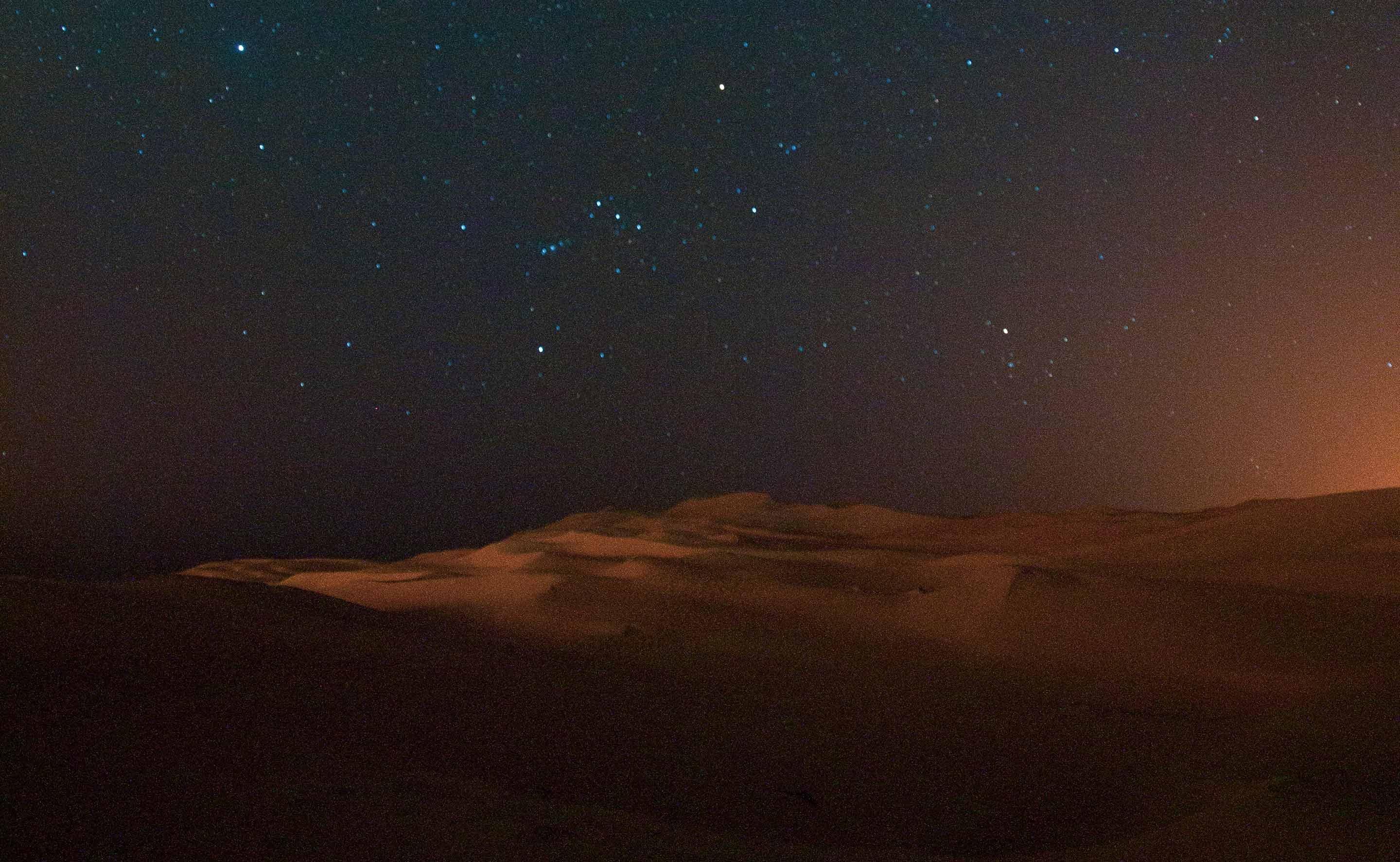 View of stars from the private dining set-up in the desert at Bab Al Shams